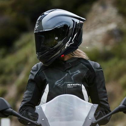 Alpinestars Supertech R10 carbon helmet, advanced ventilation, CE certified, high-performance.
